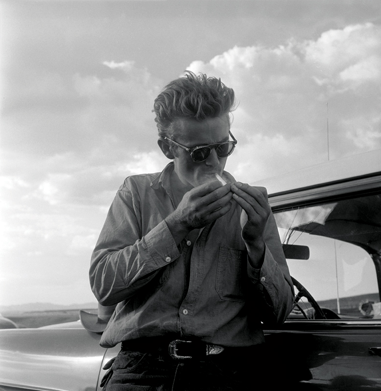 James Dean Lighting a Cigarette, While Making Giant, Marfa, TX, 1955