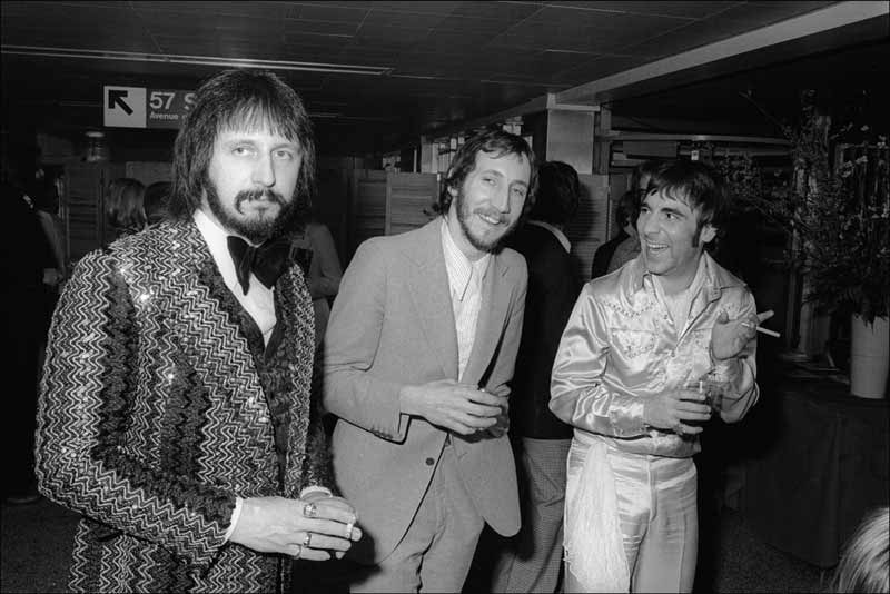 John Entwistle, Pete Townshend and Keith Moon of The Who at a party for the film Tommy, NYC, 1975