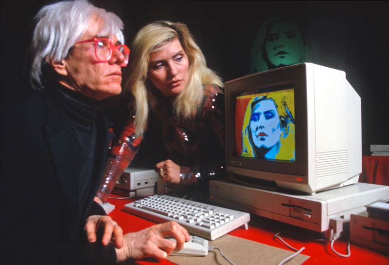 Andy Warhol and Debbie Harry Demonstrating the Amiga Computer, NYC, 1985