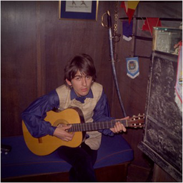 _George Harrison with Spanish guitar, circa 1966
