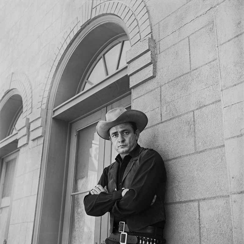 Johnny Cash Western Portrait Against Wall, Melody Ranch, Newhall, CA, 1960