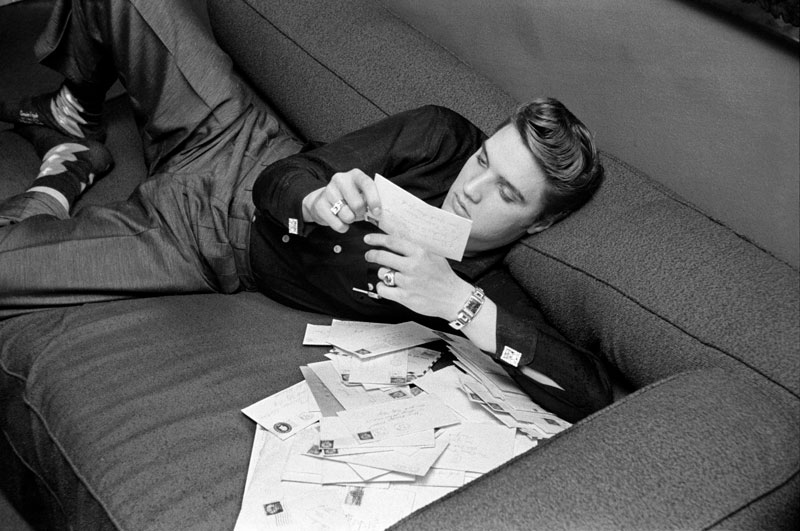 Elvis Presley Reading His Fan Mail, 1956