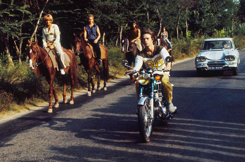 Mick Jagger Riding Honda with Friends, France, 1971