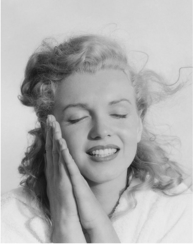Marilyn Monroe, Terry Cover Up Praying Hands Next to Face, Tobay Beach, NY, 1949