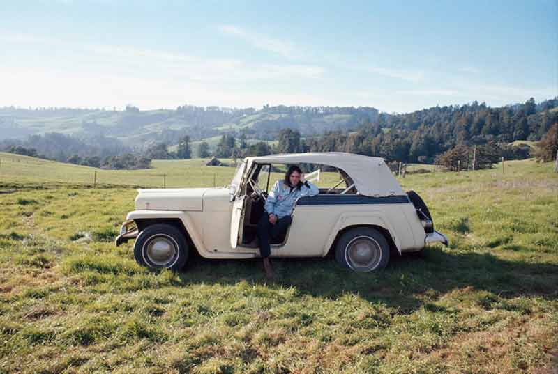 Neil Young Sitting in his Overland Jeepster, Broken Arrow Ranch, CA, 1971