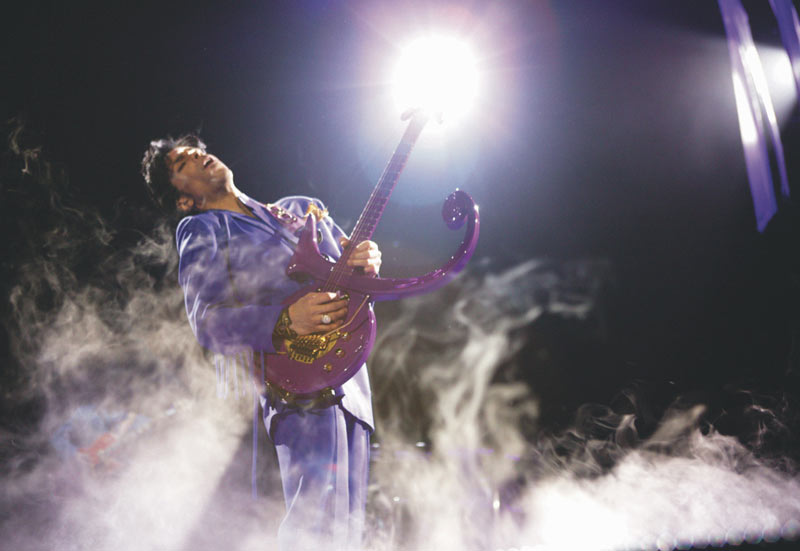 Prince Onstage in Smoke (Leaning Back) SLC 2004