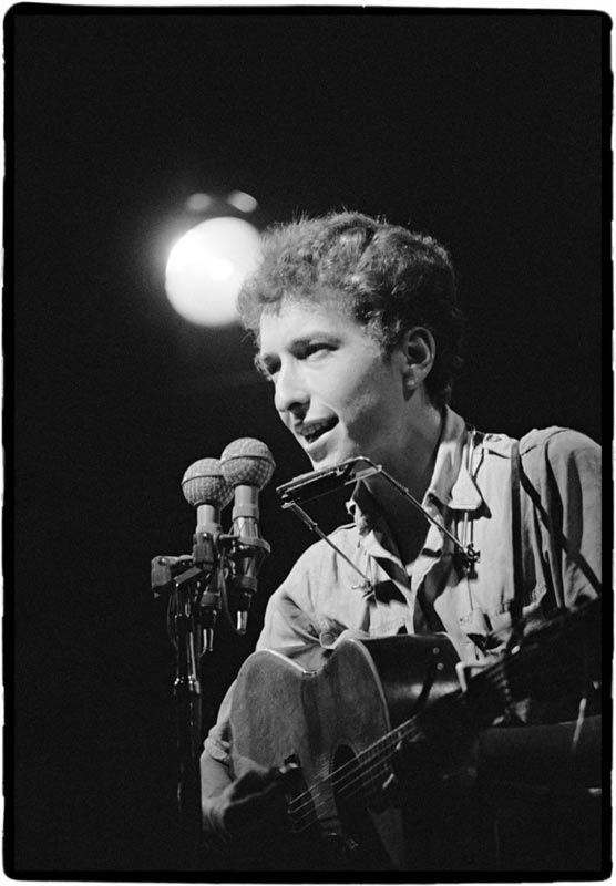 Bob Dylan Singing into Mics (spot behind), Newport Folk Festival, 1963